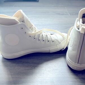 Converse -  Chuck Taylor high tops - 8.5. Brand new never worn
